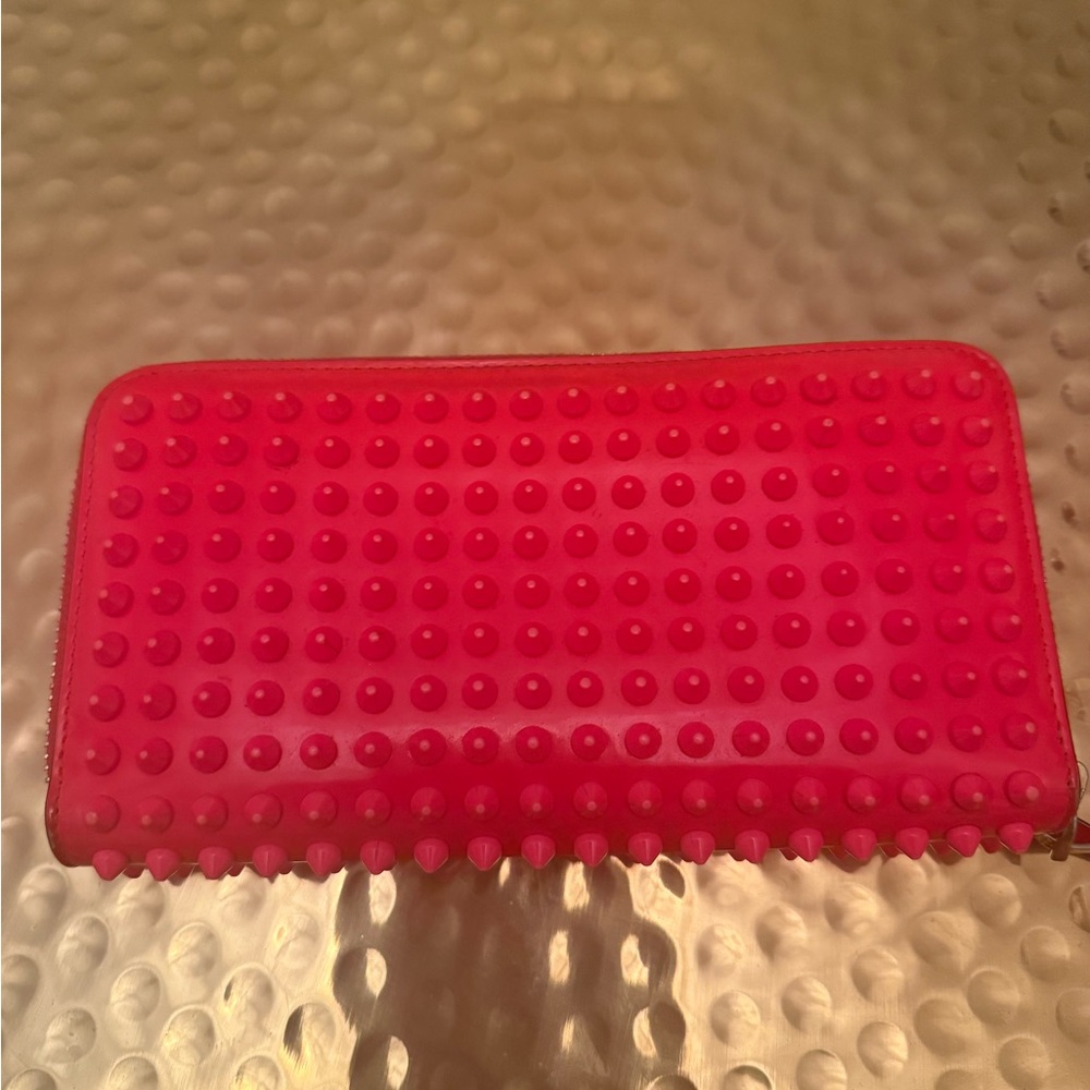 Christian Louboutin wallet in hot pink